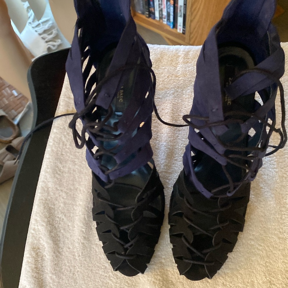 Woman’s 4 1/2 inch heel suede blue and black lace up . Worn only two times